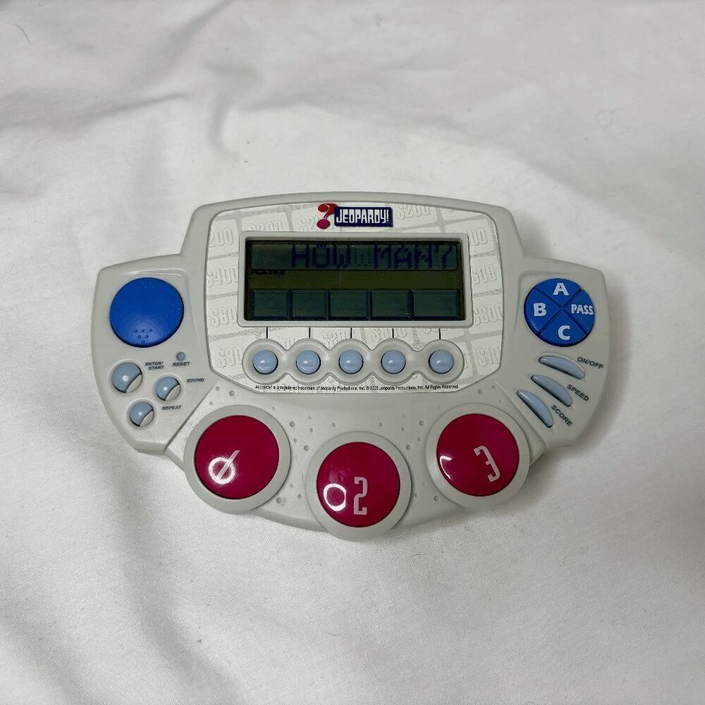 Tiger Electronics 2005 Jeopardy Handheld Game 1200 Questions Travel Game